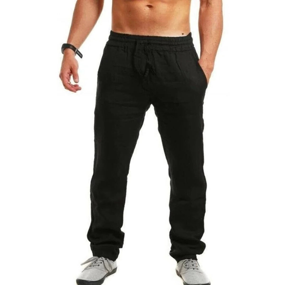 Men's Belro linen summer pants in light, breathable fabric, shown in a relaxed fit with a neutral color.