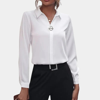 Elegant plain ladies blouse by Belro, shown in a soft fabric with a classic fit, perfect for stylish everyday wear.