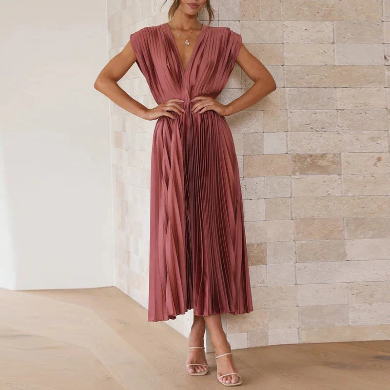 Belro V-neck dress featuring a flattering neckline and elegant fit, displayed on a neutral background.