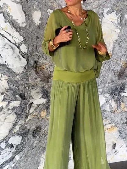 Belro elegant two-piece wide-leg chiffon pants set, featuring flowing fabric and stylish design, shown on a model.