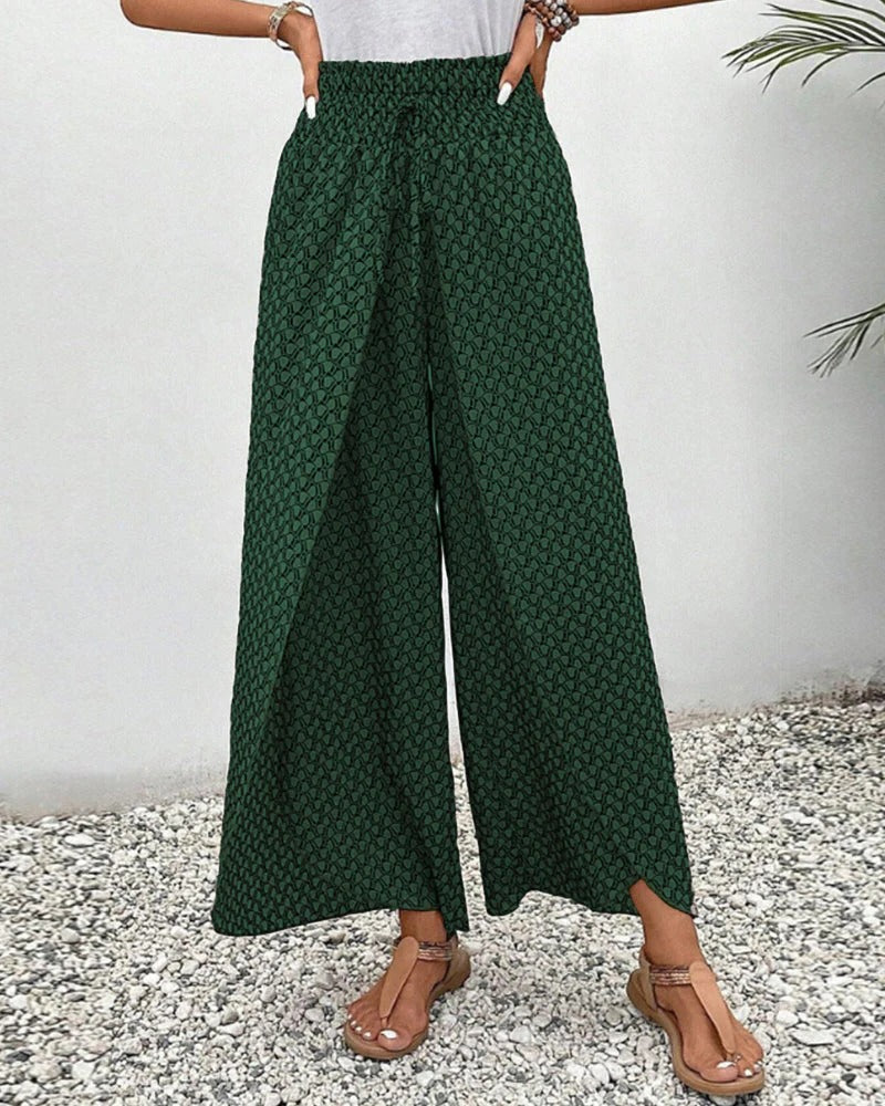 Women’s geometric print trousers by Belro, stylish and comfortable pants featuring a modern pattern and tailored fit.
