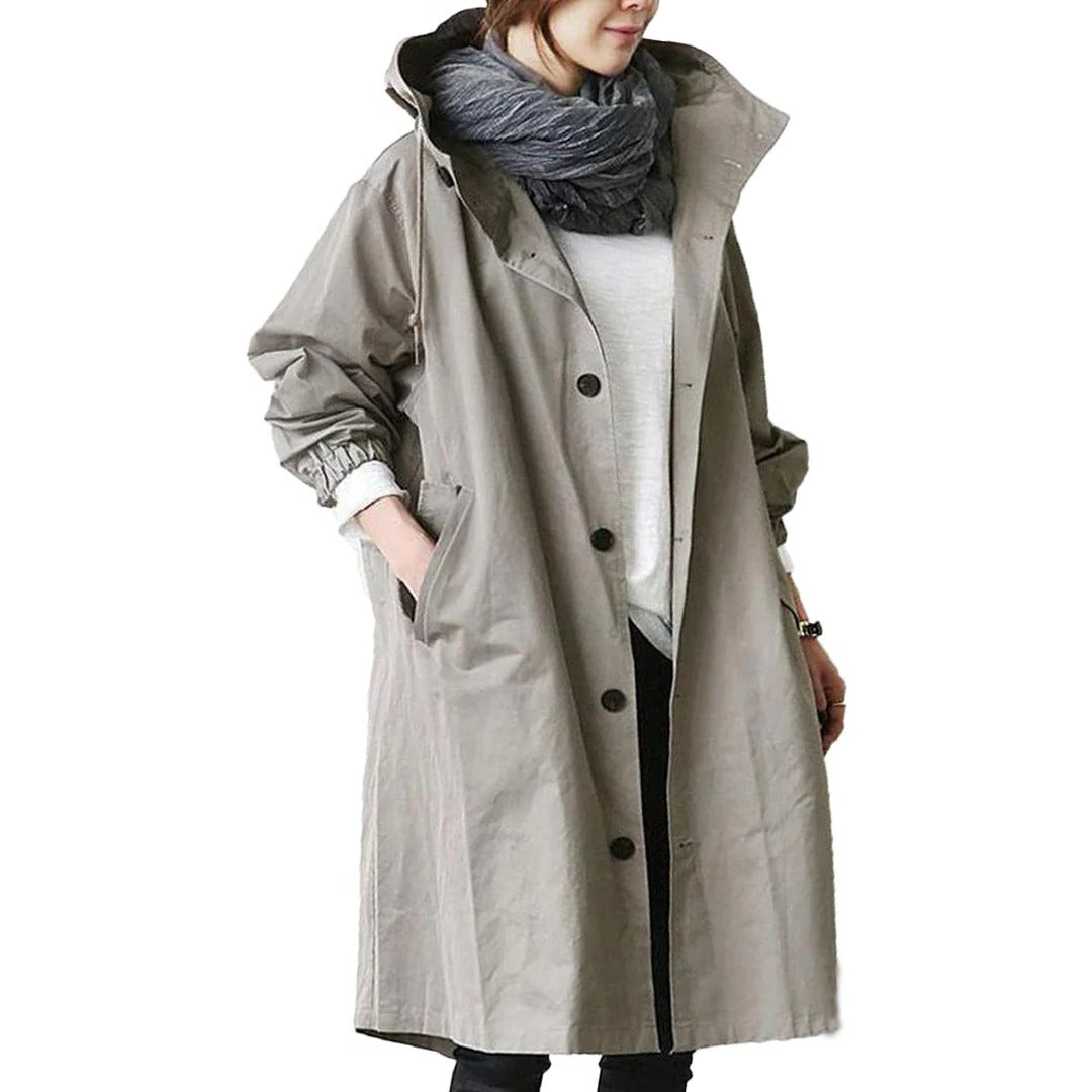 Belro women's long waterproof raincoat showing a sleek, navy blue rain jacket with a hood and front zipper for rainy weather.