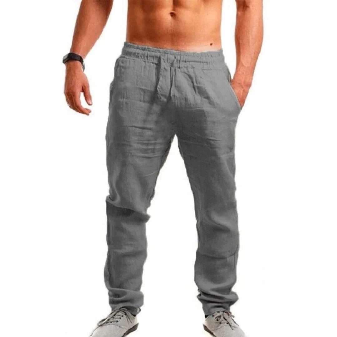 Men's lightweight linen summer pants by Belro, shown in beige with a relaxed fit and side pockets.