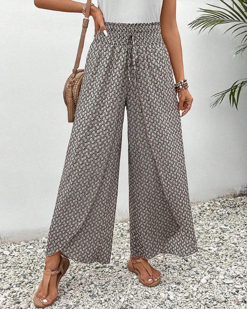Women's Belro trousers with geometric print, stylish pants featuring a modern pattern and tailored fit.