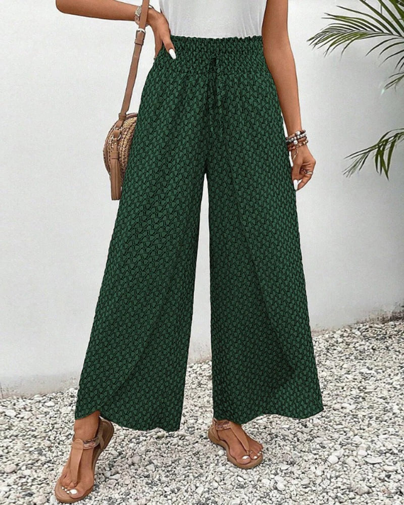 Women's Belro trousers with a stylish geometric print, featuring a tailored fit and versatile design for casual or professional wear.