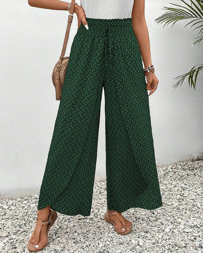 Women's Belro trousers with a stylish geometric print, featuring a tailored fit and versatile design for casual or professional wear.