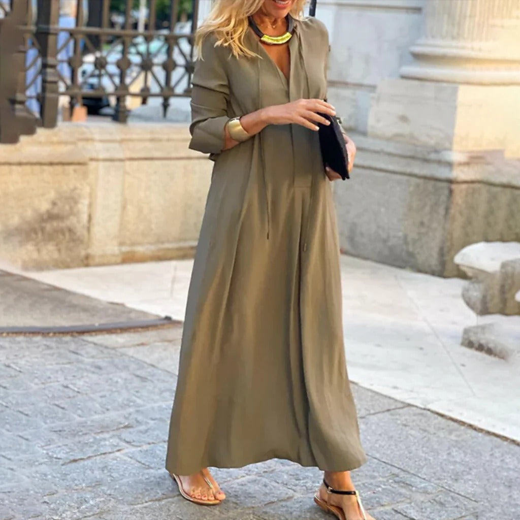 Simple casual women's dress by Belro featuring a relaxed fit, short sleeves, and a knee-length, versatile design.