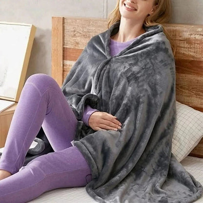 Belro USB electric heated blanket spread on bed, showcasing its soft fabric and connection cord for cozy warmth.