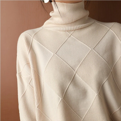 Belro knitted sweater, cozy and stylish, shown in a natural pose, highlighting the textured fabric and classic design.