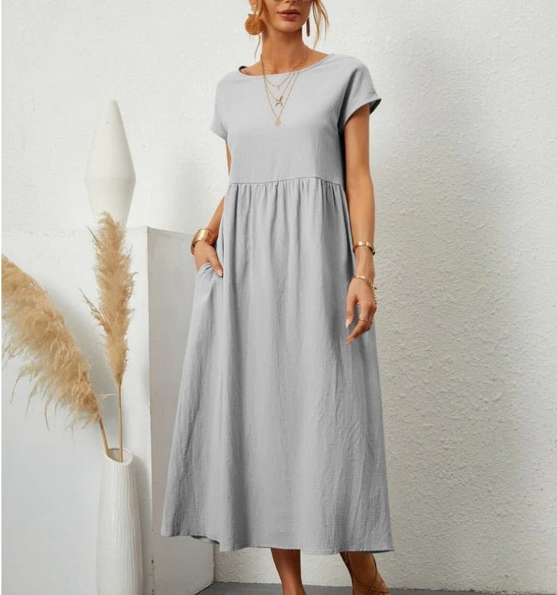 Belro stylish summer dress featuring a lightweight fabric, sleeveless design, and vibrant floral pattern for warm-weather wear.
