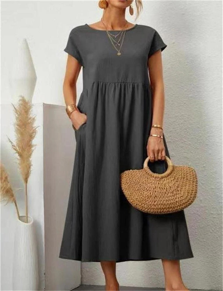 Belro stylish summer dress in lightweight fabric with floral pattern, sleeveless design, and flowy skirt.