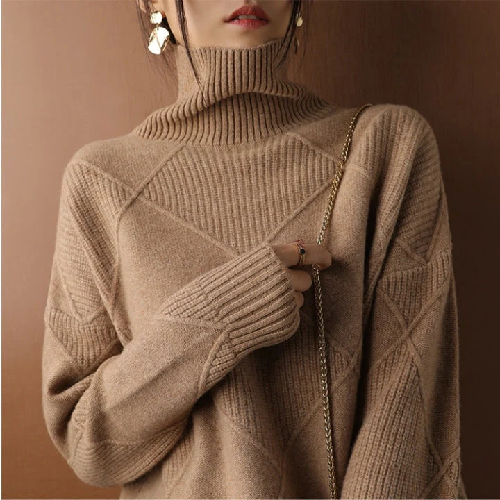 Belro knitted sweater in cozy wool with a textured pattern, featuring a round neckline and long sleeves, suitable for casual wear.