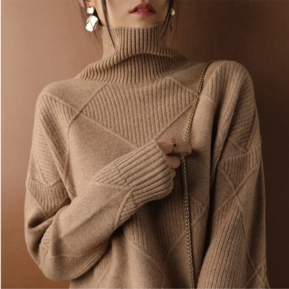 Belro knitted sweater in cozy wool with a textured pattern, featuring a round neckline and long sleeves, suitable for casual wear.