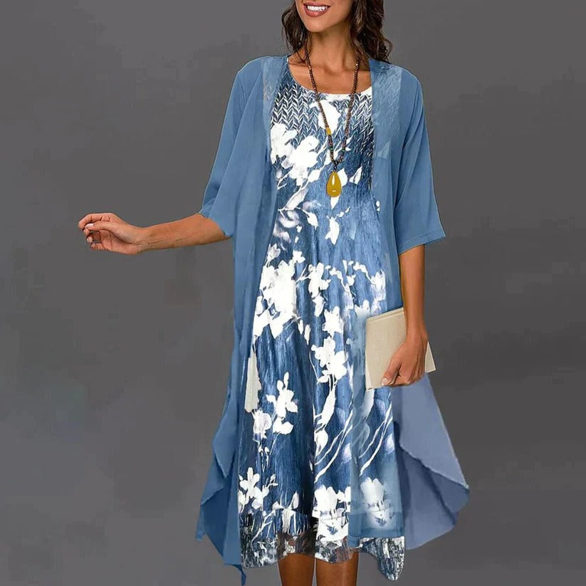 Elegant women's dress by Belro featuring a stylish design, displayed on a hanger with a soft fabric texture.
