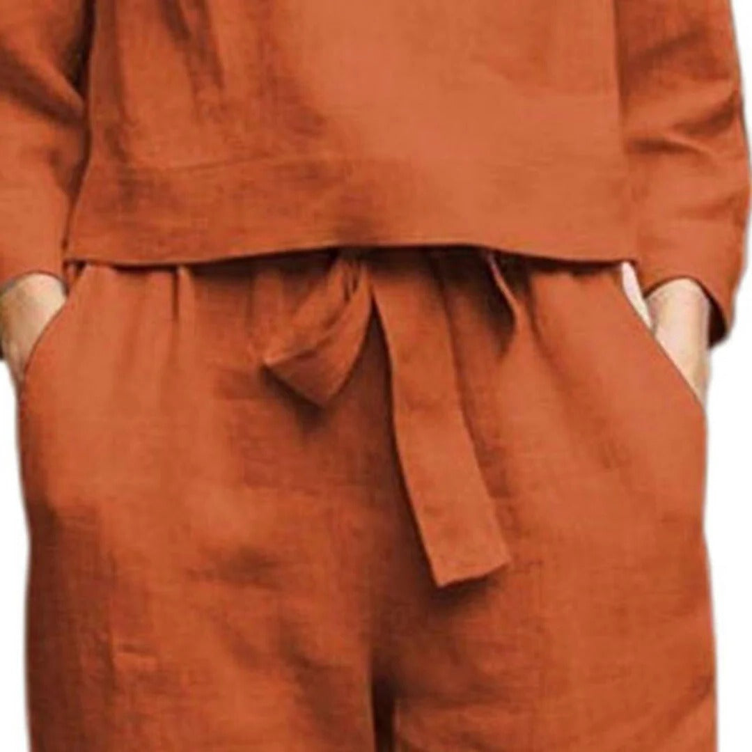Belro stylish two-piece sleepwear set featuring a comfortable top and matching pants for relaxed nighttime wear.