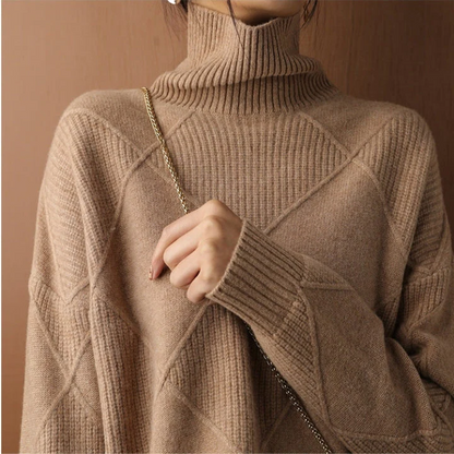 Belro knitted sweater in beige, featuring a cozy, textured knit pattern and a classic crew neck design.