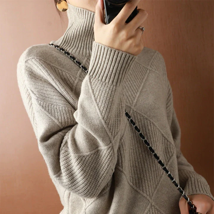 Belro knitted sweater featuring a cozy, textured design in a neutral color, perfect for casual and layered winter outfits.