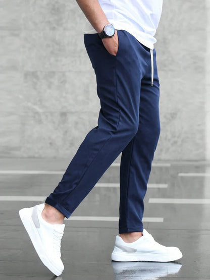 Men's Belro stretch pants in a classic fit, featuring a smooth fabric and modern design for comfortable everyday wear.