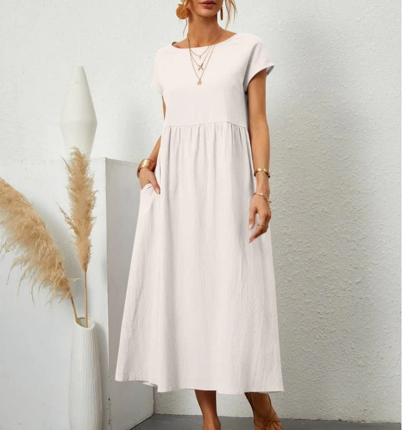 Belro stylish summer dress featuring a light, flowy fabric with floral patterns, perfect for warm weather and casual outings.