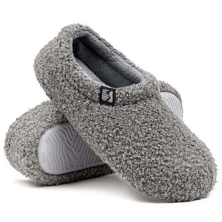 Belro fleeced closed back indoor slippers with soft lining and slip-on design for cozy comfort at home.