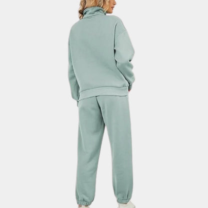 Belro women's two-piece tracksuit in soft sleepwear fabric, featuring a comfortable hoodie and matching jogger pants.