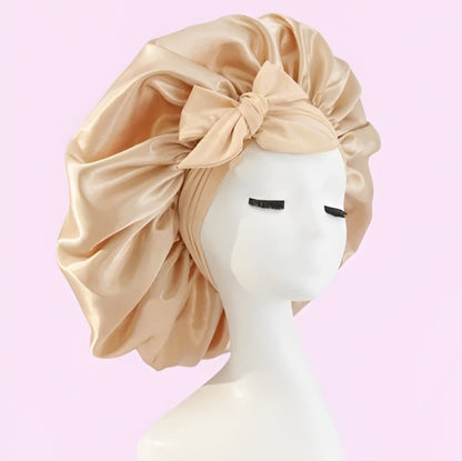 Belro All-Night Silk Bonnet for hair protection and comfort, shown in smooth, shiny silk fabric with an adjustable tie.