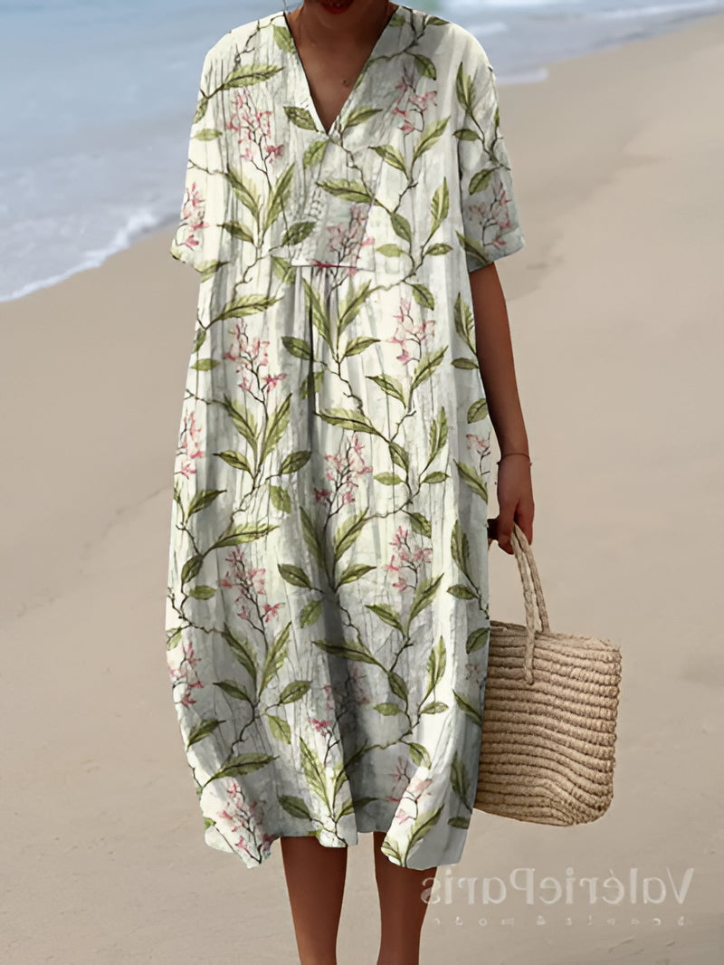 Belro summer dress with floral pattern, sleeveless design, lightweight fabric, perfect for warm weather and outdoor wear.