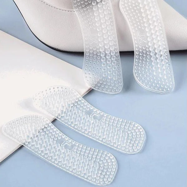 Belro silicone heel grips providing cushioning and comfort for footwear, shown attached inside a shoe for improved fit.