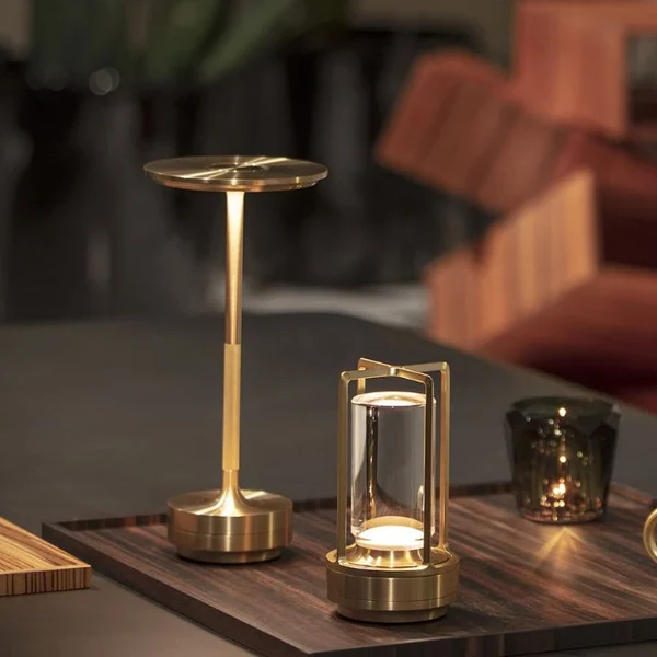 Belro Bailey table lamp with sleek modern design, featuring a cylindrical base and adjustable neck for desk lighting.