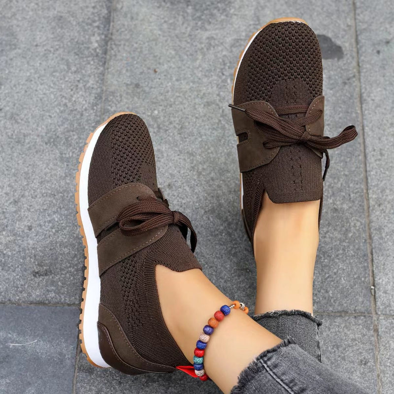 Belro orthopedic mesh sneakers with supportive design, shown from a side view highlighting breathable mesh material and sporty style.