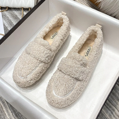Belro plush slipper shoes with soft, cozy fabric and slip-on design for comfortable indoor footwear.