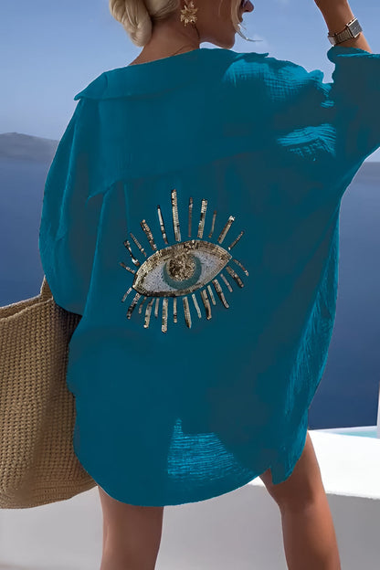 Belro Evil Eye shirt with sequin beads, showcasing detailed embroidery and vibrant design on soft fabric.