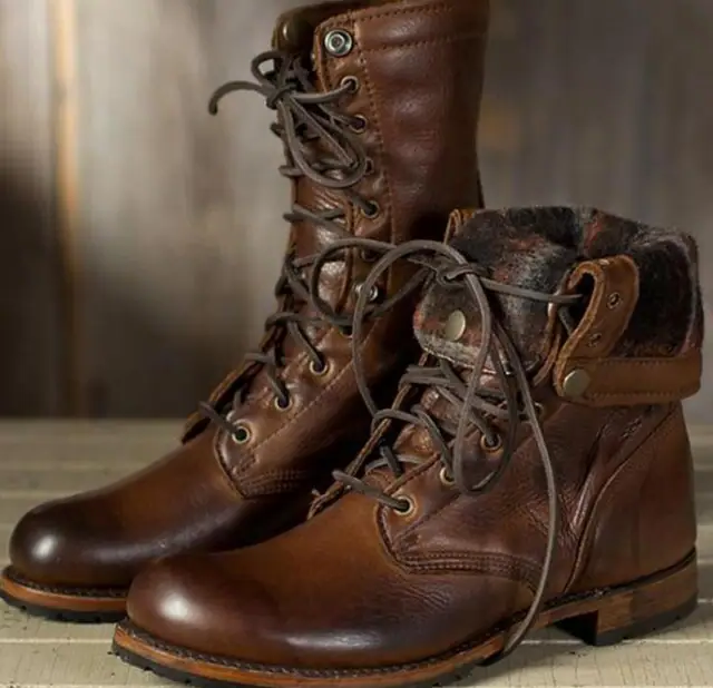 Belro women's boots featuring stylish ankle-high design with leather material and decorative stitching.