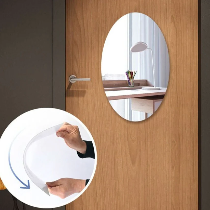 Oval-shaped adhesive mirror from Belro, showing the smooth reflective surface with a clean adhesive backing for easy installation.