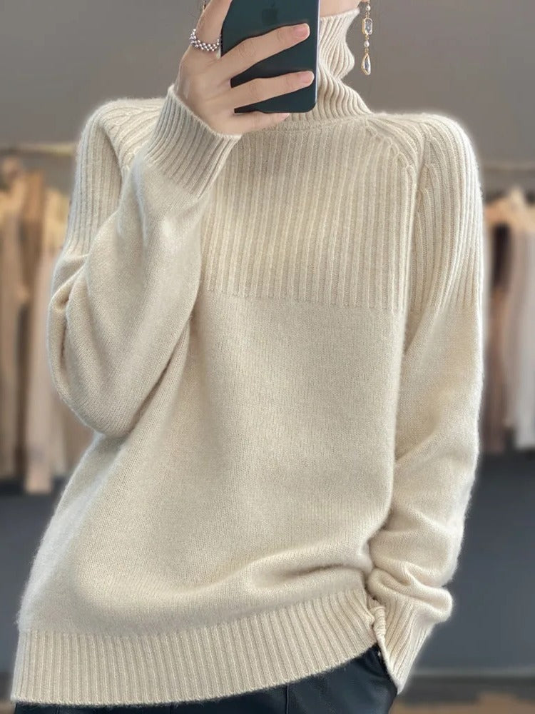 Belro women's cashmere turtleneck sweater, soft knit fabric, close-up of cozy, stylish sweater worn by a model.