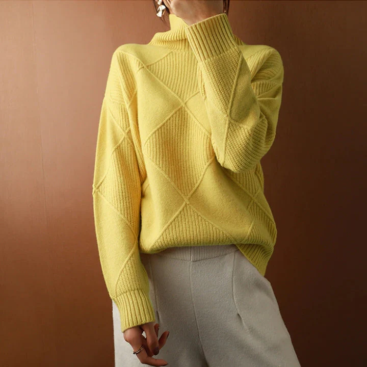 Belro knitted sweater with a cozy, textured knit pattern, featuring a classic crew neck and long sleeves.
