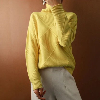 Belro knitted sweater with a cozy, textured knit pattern, featuring a classic crew neck and long sleeves.