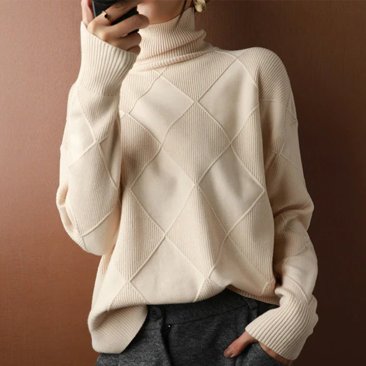 Belro knitted sweater, cozy long-sleeve clothing with textured knit pattern, in neutral color, displayed on a plain background.