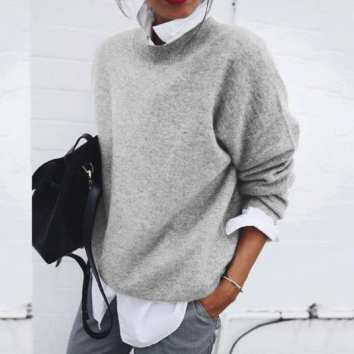 Soft Belro cashmere sweater with a cozy, lightweight design, featuring a classic crewneck and ribbed cuffs.