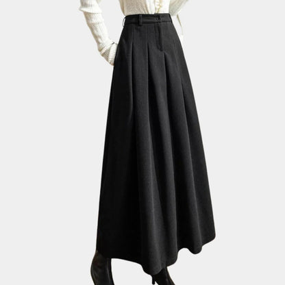 Elegant ladies Belro skirt featuring a stylish design, displayed on a hanger with a smooth fabric finish and intricate detailing.
