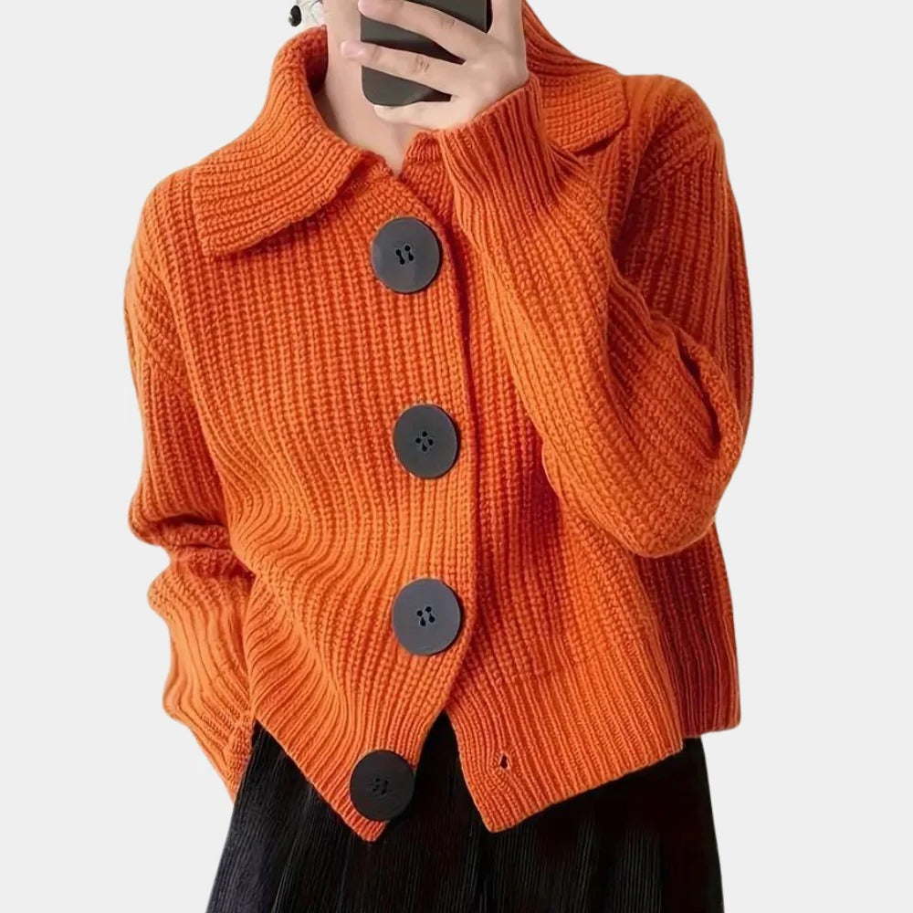 Elegant ladies cardigan by Belro, featuring a stylish automotive-inspired design with detailed fabric texture.
