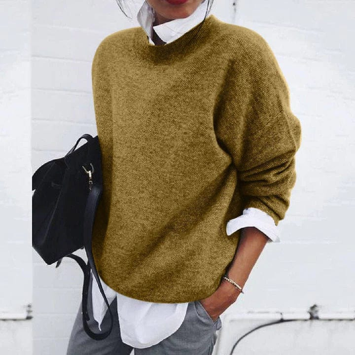 Belro soft cashmere sweater in neutral color, showcasing its cozy knit texture and classic fit for stylish comfort.