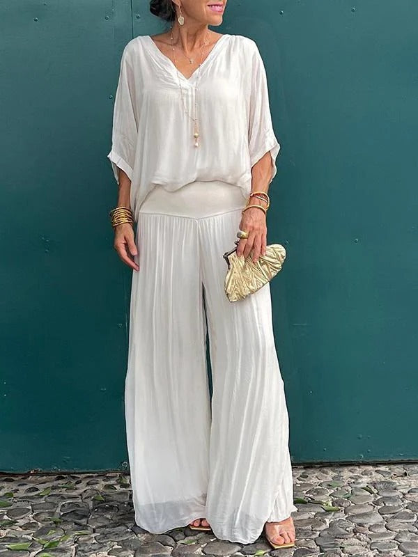 Elegant Belro two-piece wide-leg chiffon pants set with flowing fabric and stylish design, perfect for sophisticated casual wear.