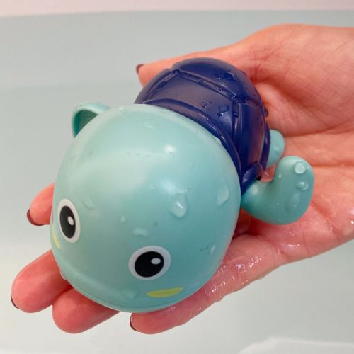Colorful Belro swimming bath toys for kids, featuring various cute, floating plastic toys ideal for bath time fun.