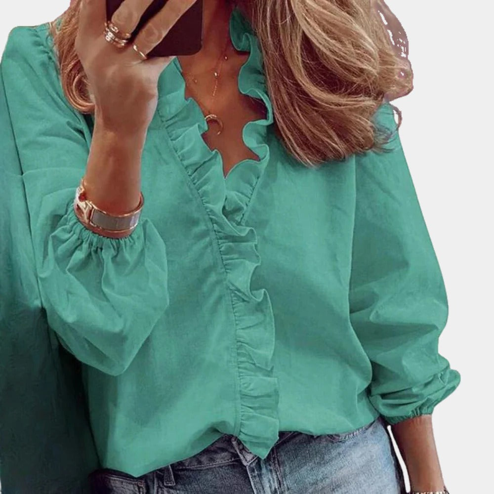 Belro women's elegant and trendy blouse, stylish top with a fashionable fit, displayed on a hanger against a neutral background.