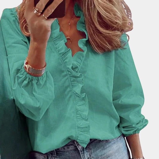 Belro women's elegant and trendy blouse, stylish top with a fashionable fit, displayed on a hanger against a neutral background.