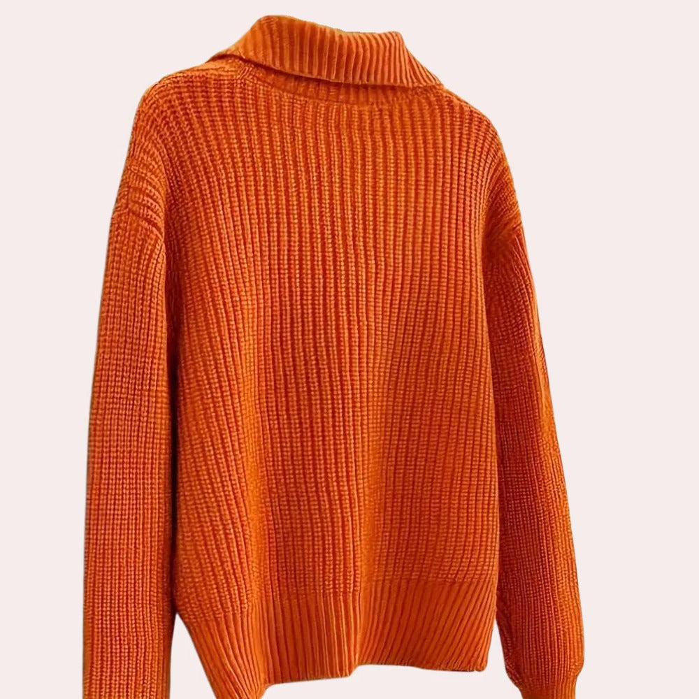 Elegant ladies cardigan from Belro, displayed on a mannequin with detailed knit fabric and classic design.