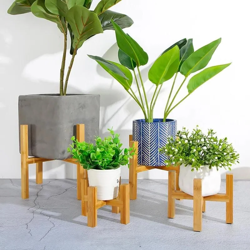 Belro wooden plant pot trays for outdoor gardening, crafted from natural wood, ideal for supporting potted plants outdoors.