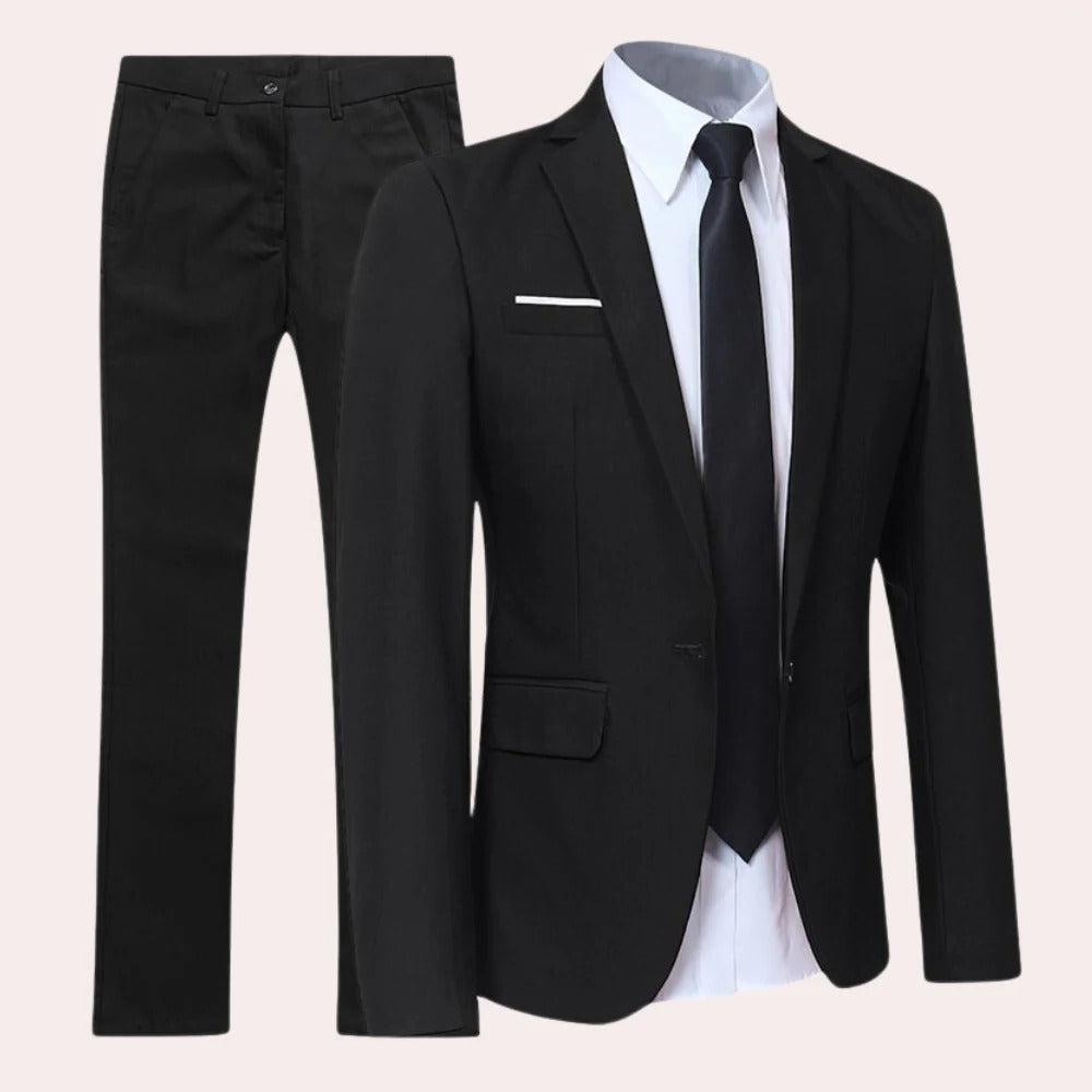 Men's Belro suit in classic tailored style, featuring a dark blazer and matching trousers, displayed on a mannequin.