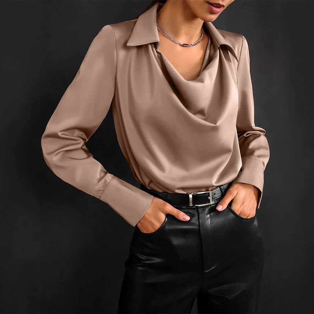 Elegant silk blouse for women by Belro, showcasing a stylish, flowing top with a smooth, shiny fabric and classic design.
